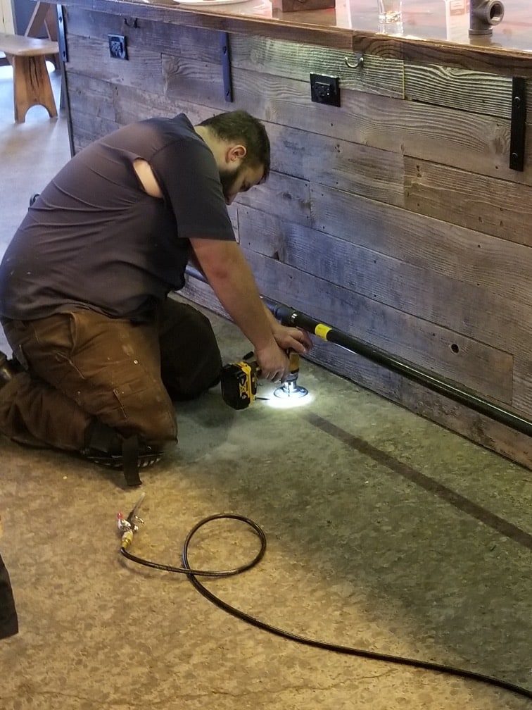 Davey is working hard to install a brand new foot rest at the bar! Come try it out, …